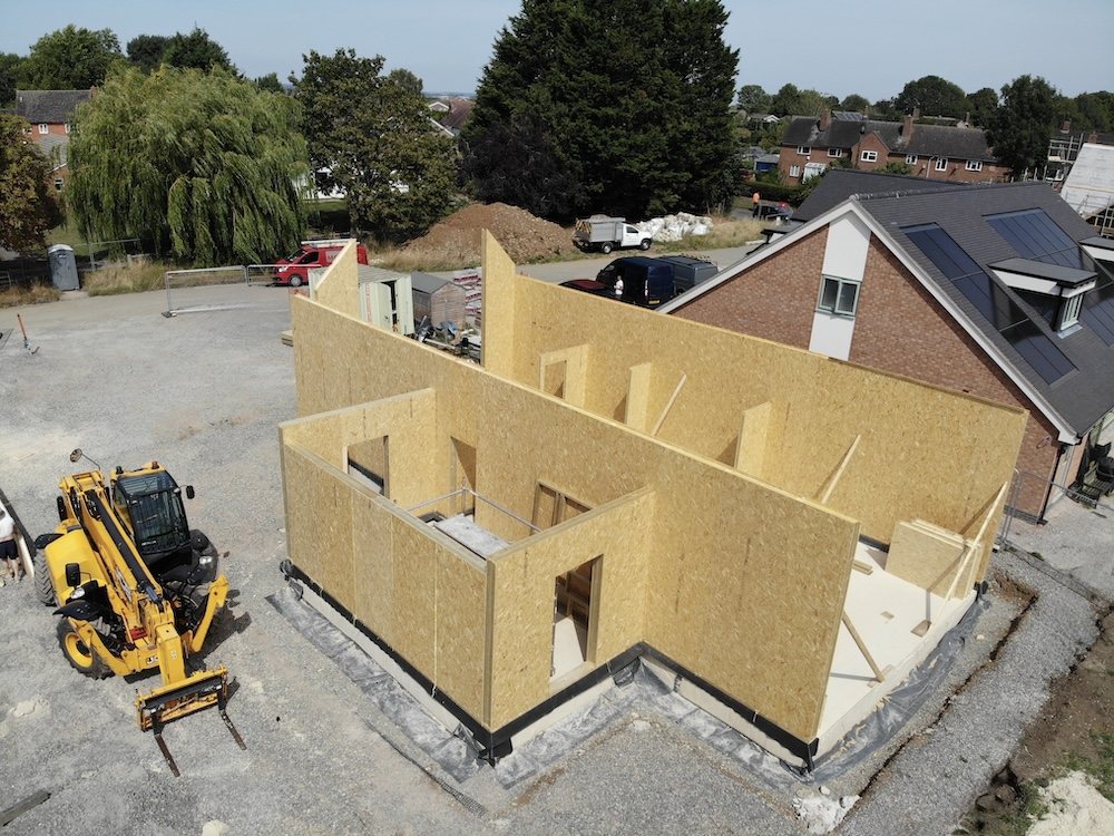 SIPs structural insulated panels being installed on site