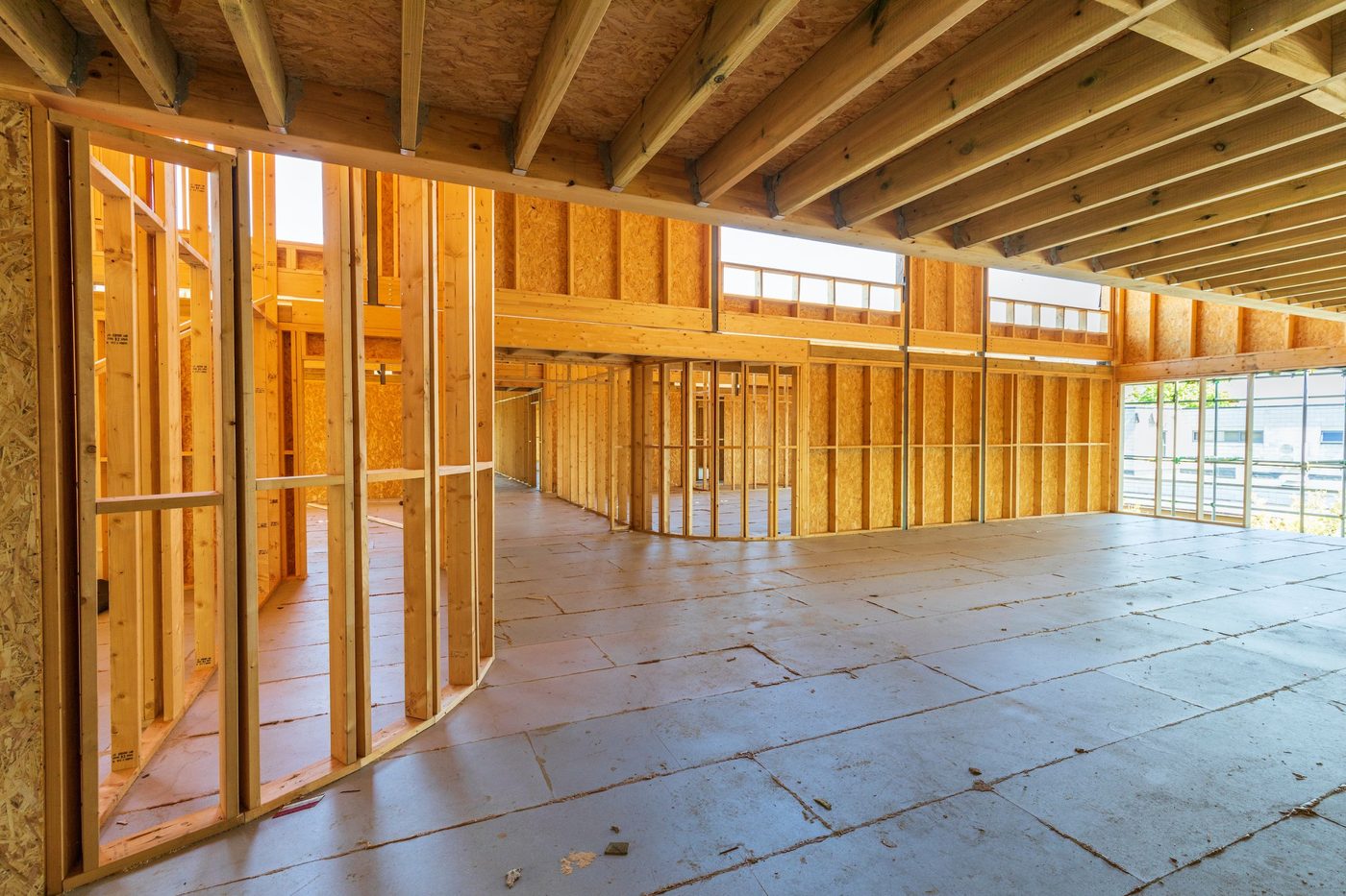 Timber frame walls and floor joists before boarding